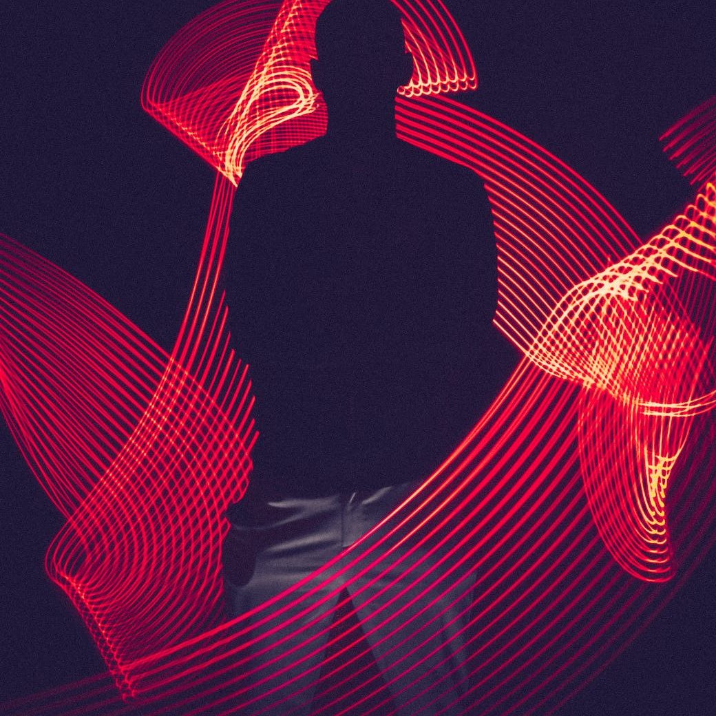 red led light with silhouette of a man